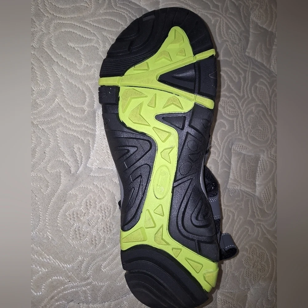 A pair of Coleman George sandals in a men's size 13M. They're in excellent shape